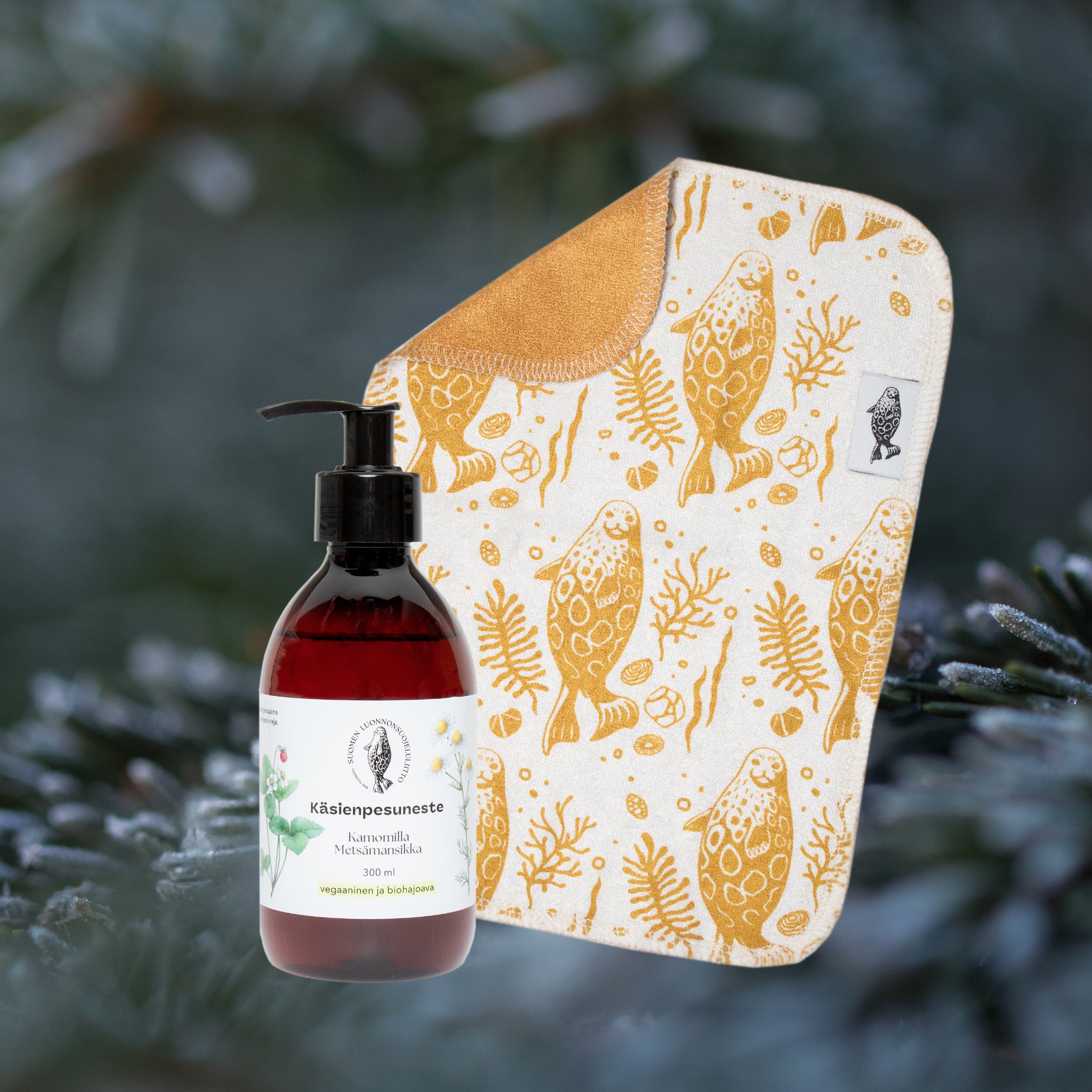 Lahjapaketti: Käsienpesuneste ja Pinnan alla -kestotiskirätti
