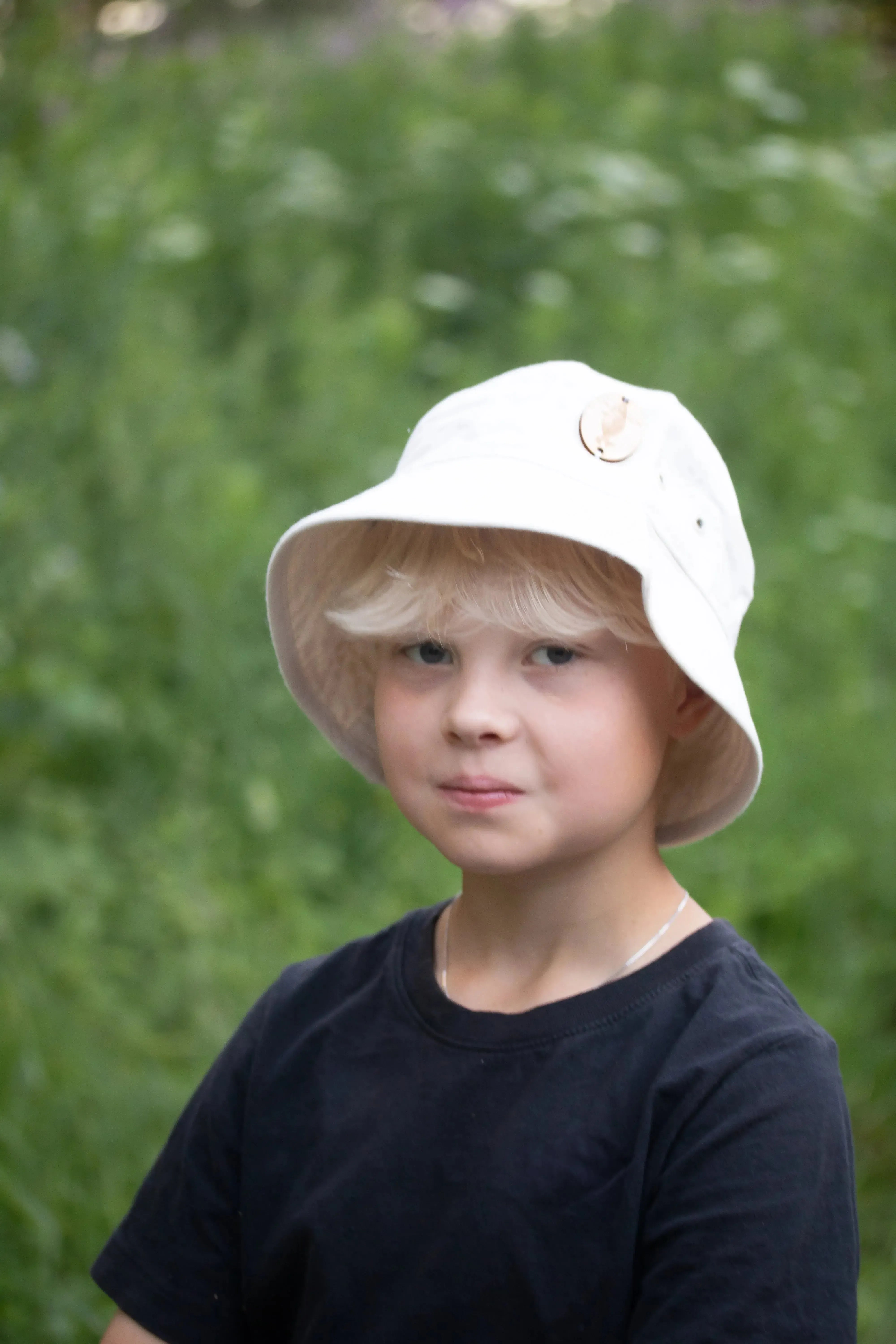 Retrologo -kalastajahattu-Päähineet ja huivit-Suomen luonnonsuojeluliiton Luontokauppa