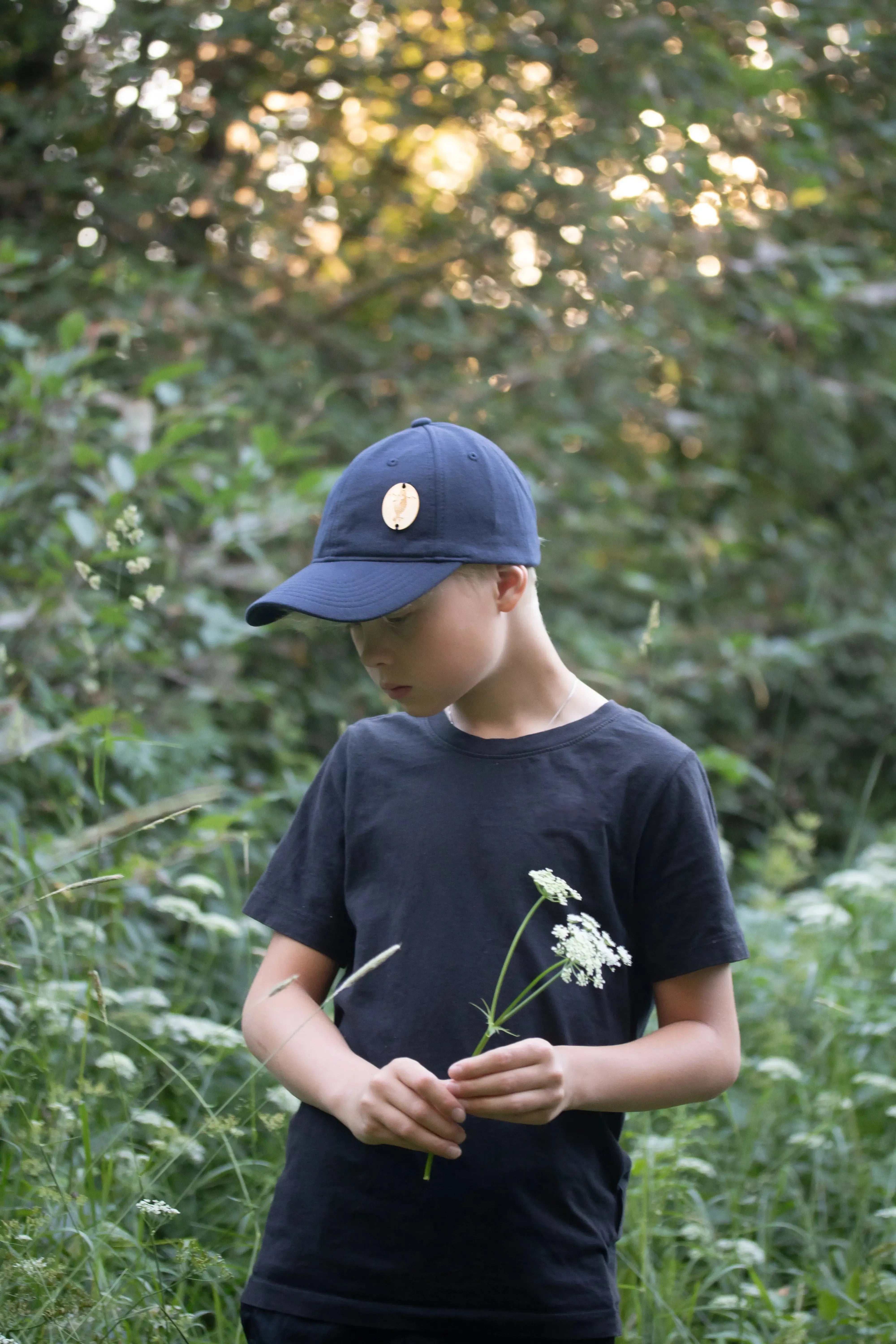 Retrologo -lippalakki-Päähineet ja huivit-Suomen luonnonsuojeluliiton Luontokauppa