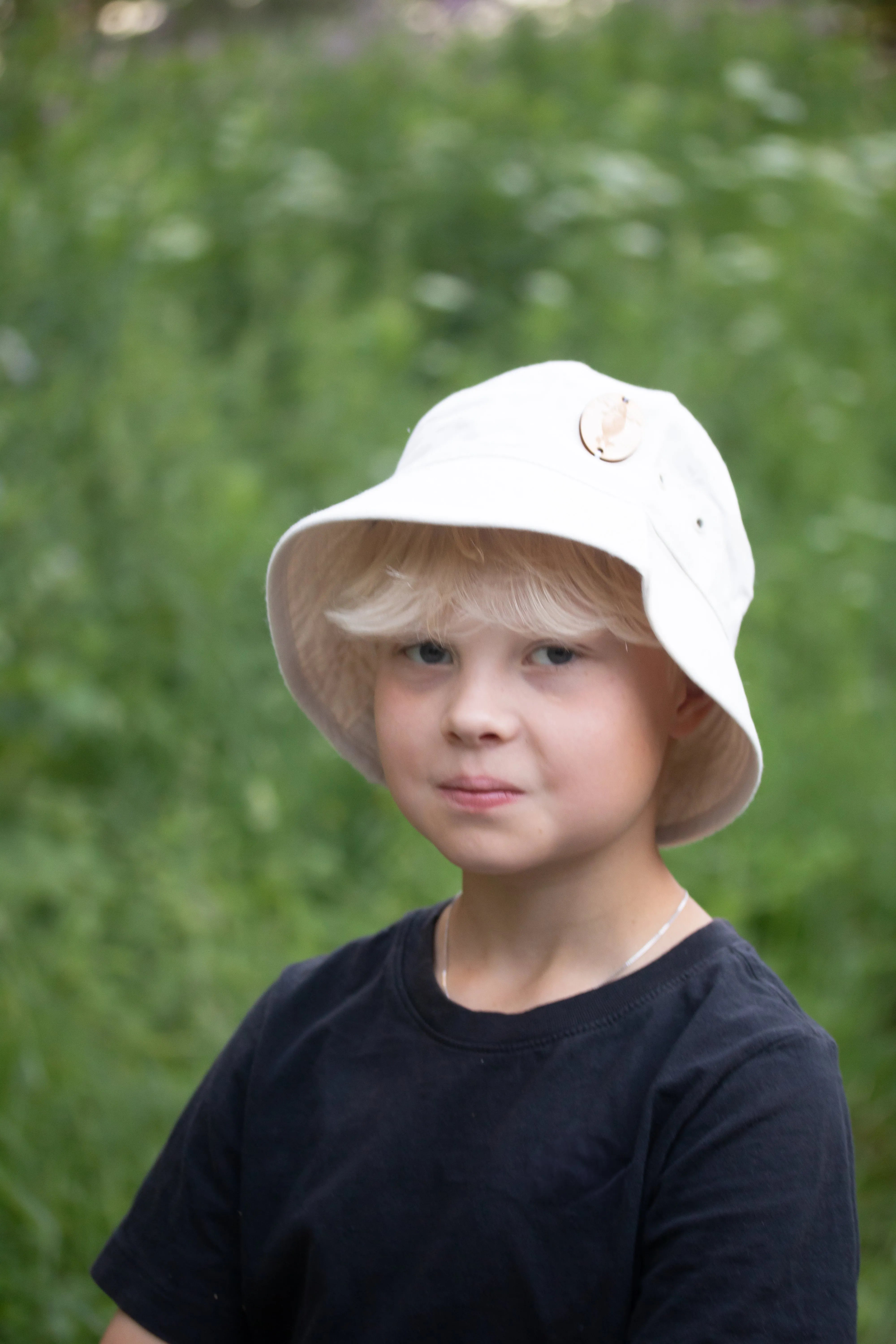 Retrologo -kalastajahattu-Päähineet ja huivit-Suomen luonnonsuojeluliiton Luontokauppa
